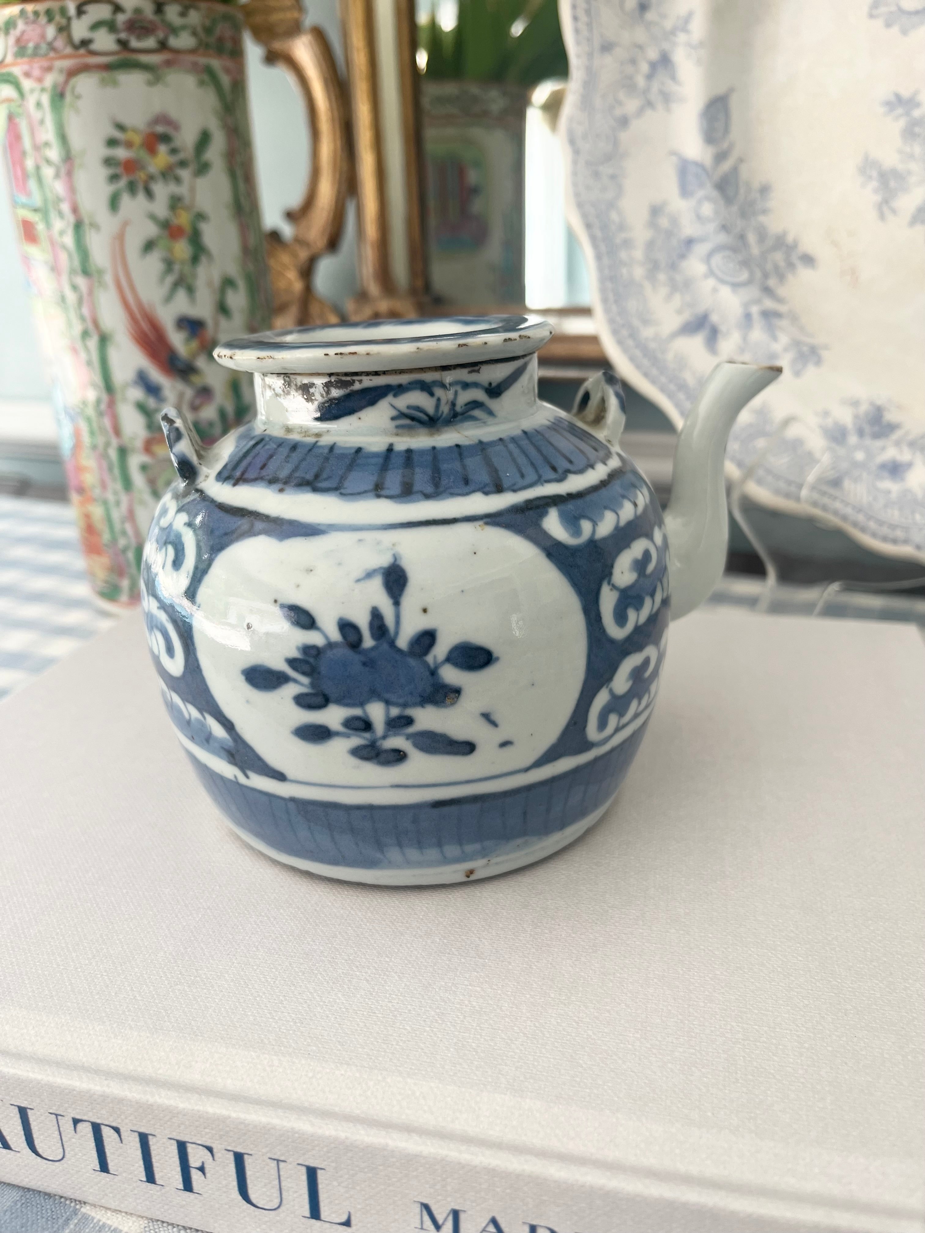 Antique Blue and White Teapot with Floral and Wave Motif