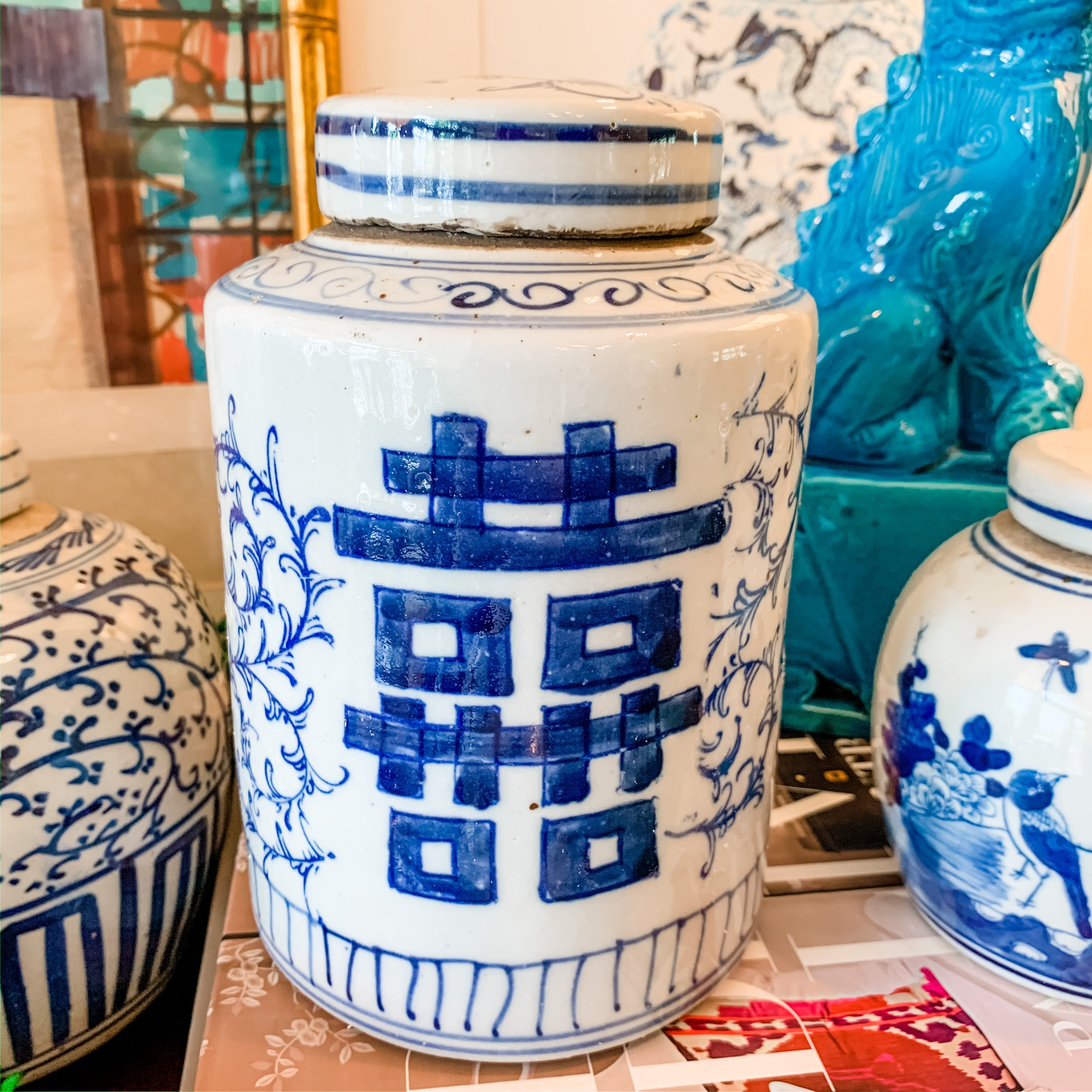 Shop Collectible Brooks for a wide selection of classic blue and white porcelain jars, perfect for adding a touch of chinoiserie to your home decor!  This beautiful hand painted jar is made in the antique style and features a double happiness design.  It stands 7.5" tall.  