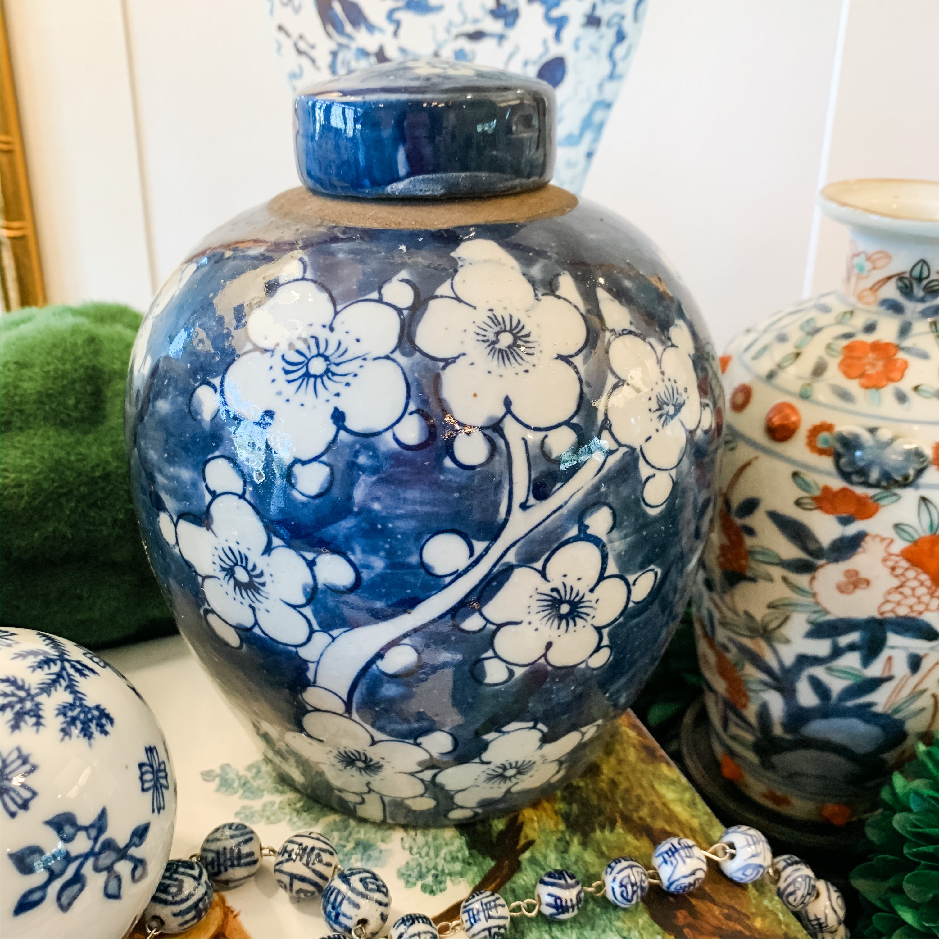 Shop Collectible Brooks for a wide selection of classic blue and white ginger jars, perfect for adding a touch of chinoiserie to your home decor!  This is a beautiful hand painted ginger jar featuring a prunus or cherry blossom design and measures 6.5" tall. 