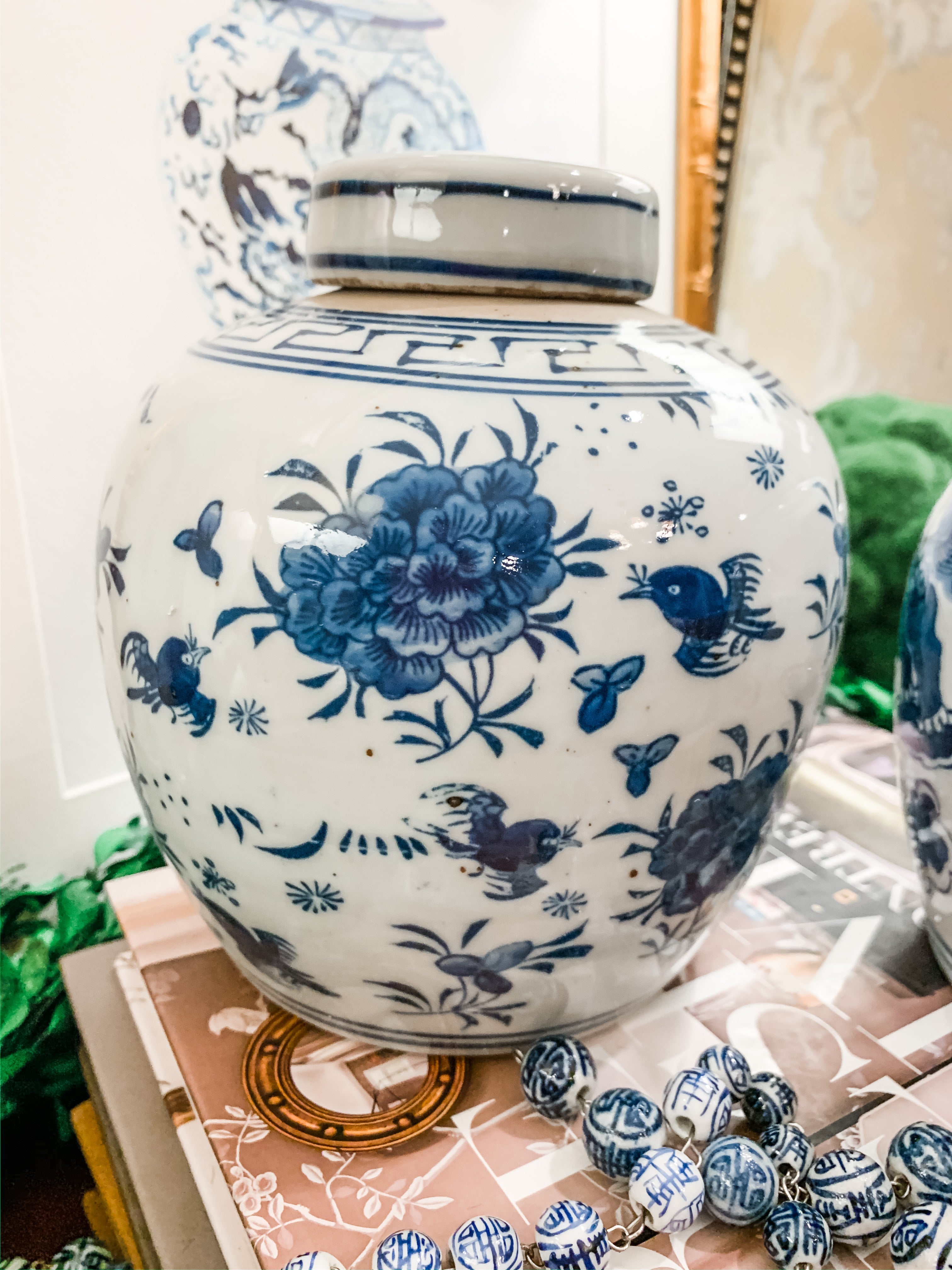 Shop Collectible Brooks for a wide selection of classic blue and white ginger jars, perfect for adding a touch of chinoiserie to your home decor!  This beautiful hand painted jar is made in the antique style and features a bird and flower design.  It stands 6.5" tall.  